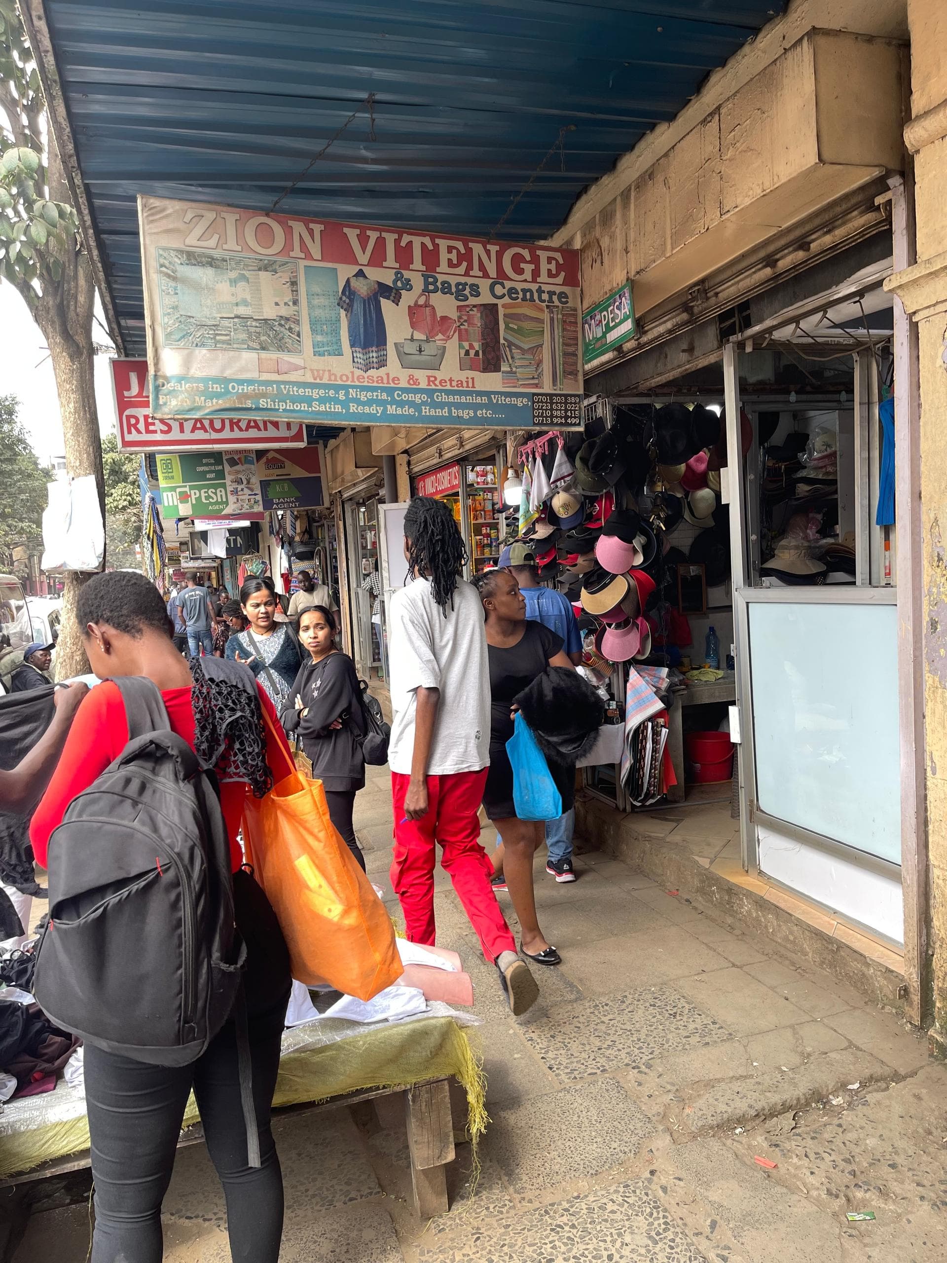 Zion Vitenge Centre banner outside Hosanni Building on River Road